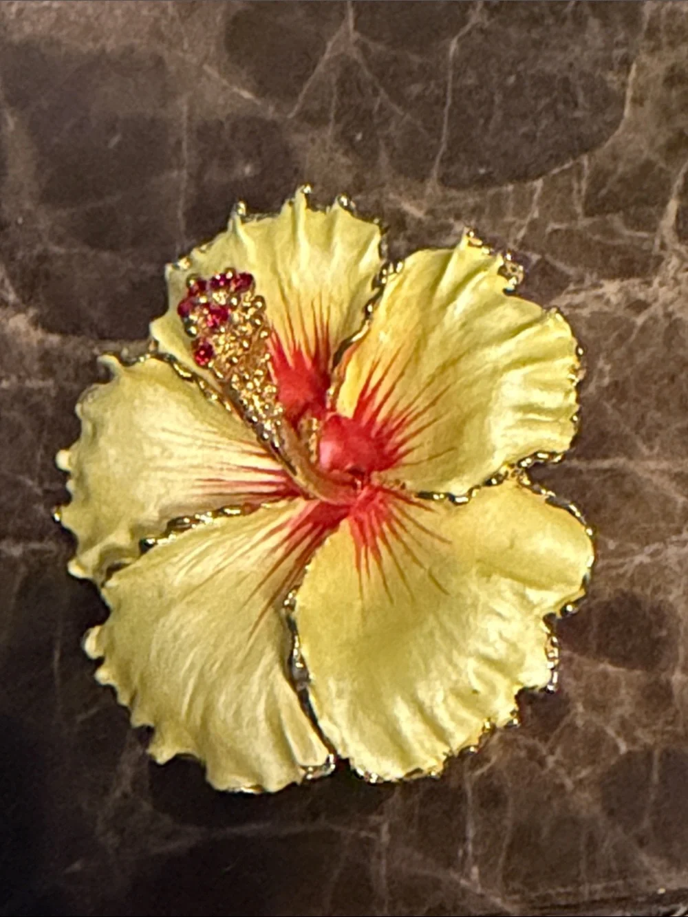 Gorgeous yellow hibiscus red crystal stand can be used as a pendant or brooch